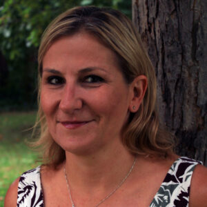 Woman with shoulder length blonde hair, smiling